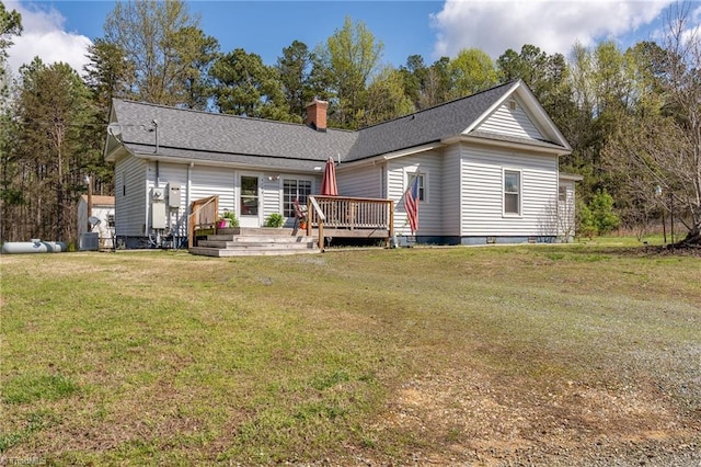 4724 Old Julian Rd, Julian, NC 27283 - back of house featuring a deck, a chimney, a yard, and a shingled roof