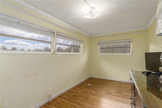 4724 Old Julian Rd, Julian, NC 27283 - unfurnished office with ornamental molding, plenty of natural light, and wood finished floors