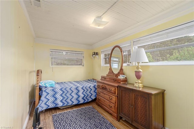 4724 Old Julian Rd, Julian, NC 27283 - bedroom featuring wood finished floors and crown molding