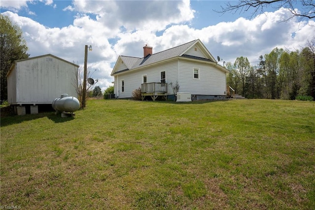 4724 Old Julian Rd, Julian, NC 27283 - rear view of house with a chimney and a yard