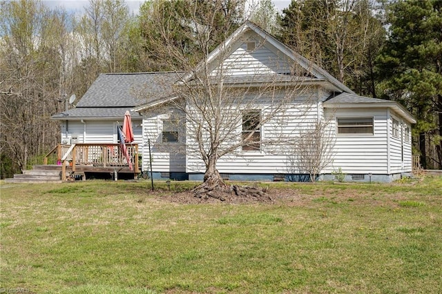 4724 Old Julian Rd, Julian, NC 27283 - back of house with a deck, a yard, and a shingled roof