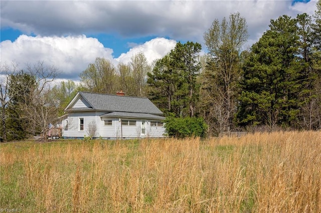 4724 Old Julian Rd, Julian, NC 27283 - view of home's exterior featuring a chimney