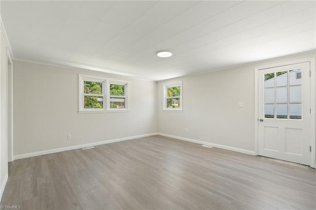 1616 Sanford Dr, Winston-Salem, NC 27105 - spare room with baseboards and wood finished floors