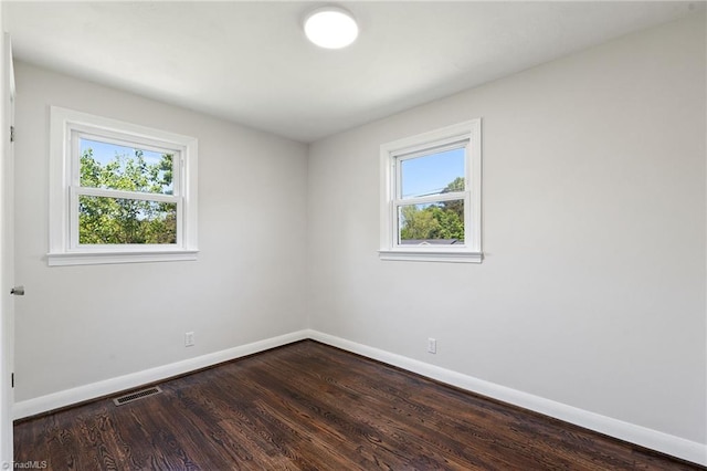 1616 Sanford Dr, Winston-Salem, NC 27105 - spare room with baseboards, a wealth of natural light, and visible vents