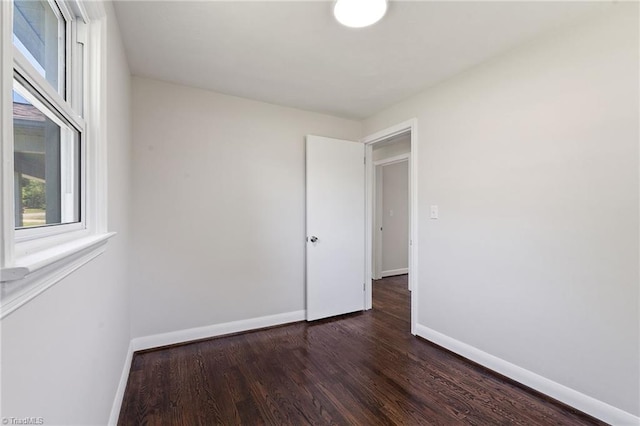 1616 Sanford Dr, Winston-Salem, NC 27105 - spare room with dark wood-style flooring and baseboards