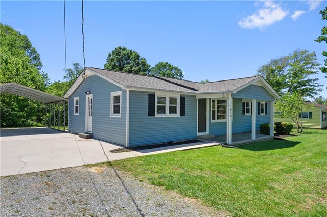 1616 Sanford Dr, Winston-Salem, NC 27105 - view of front of property featuring concrete driveway, covered porch, a front yard, and a carport
