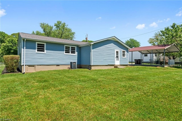 1616 Sanford Dr, Winston-Salem, NC 27105 - back of house with a detached carport, central AC, and a yard