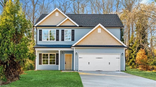 craftsman house featuring a front lawn and a garage