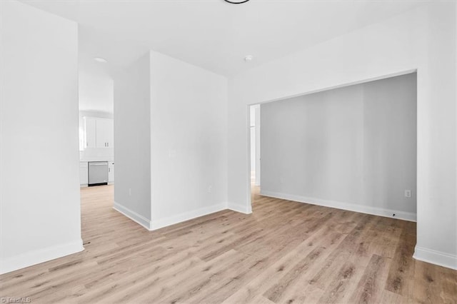 unfurnished room featuring light hardwood / wood-style flooring