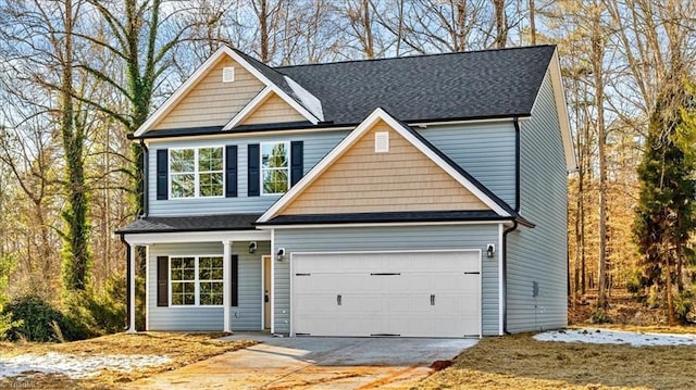 craftsman house with a garage