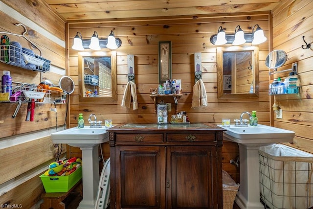 612 Joe Shoemaker Rd, Vilas, NC 28692 - bathroom featuring wooden walls and two sinks
