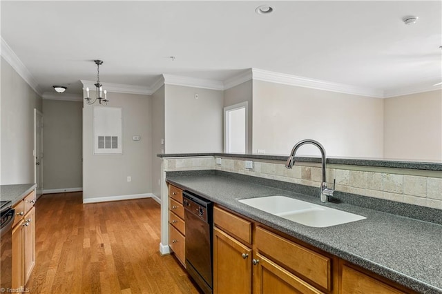 kitchen featuring dark countertops, black dishwasher, light wood-style flooring, brown cabinets, and a sink