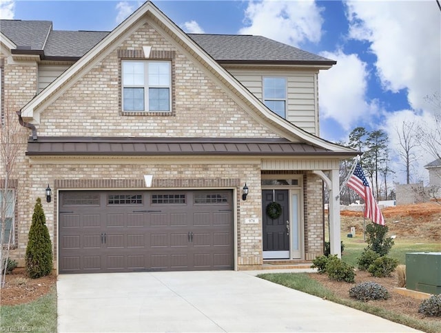 view of front of home with a garage