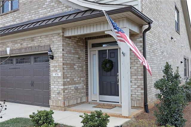 entrance to property featuring a garage