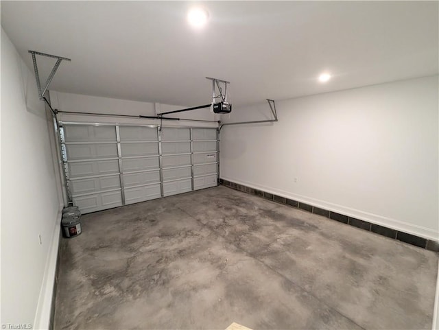 garage featuring a garage door opener