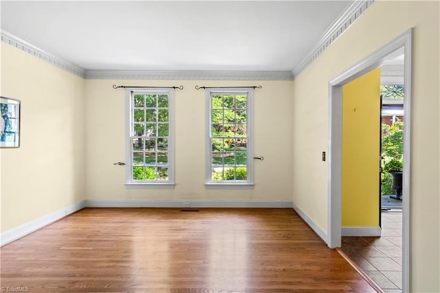 1420 Thornhill Ln, Winston-Salem, NC 27106 - empty room with wood finished floors and ornamental molding