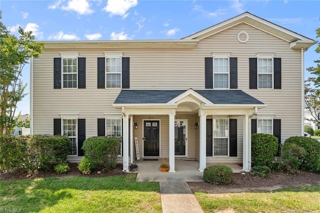 507 Geoffrey Way, Kernersville, NC 27284 - view of front of house featuring covered porch and a front lawn