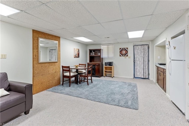 2429 Cypress Ct, High Point, NC 27265 - dining area with light colored carpet and a paneled ceiling