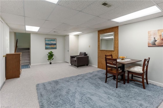 2429 Cypress Ct, High Point, NC 27265 - carpeted dining space featuring a paneled ceiling and stairway