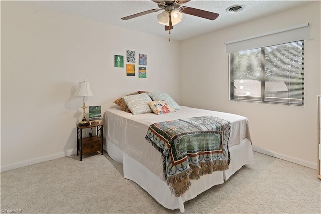 2429 Cypress Ct, High Point, NC 27265 - bedroom with light colored carpet, ceiling fan, and a textured ceiling