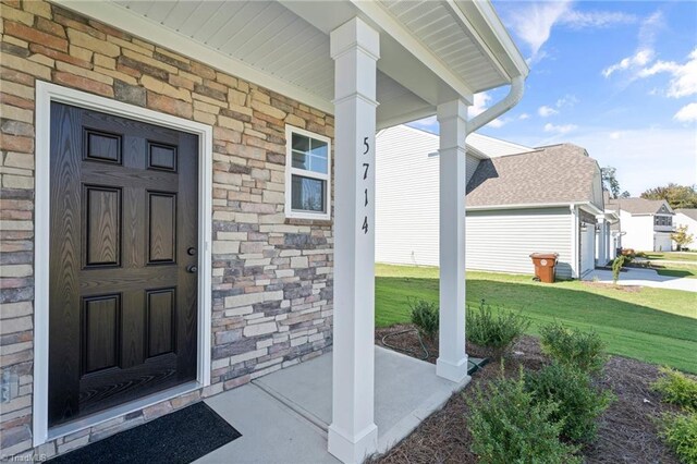 foyer entrance with light hardwood / wood-style floors