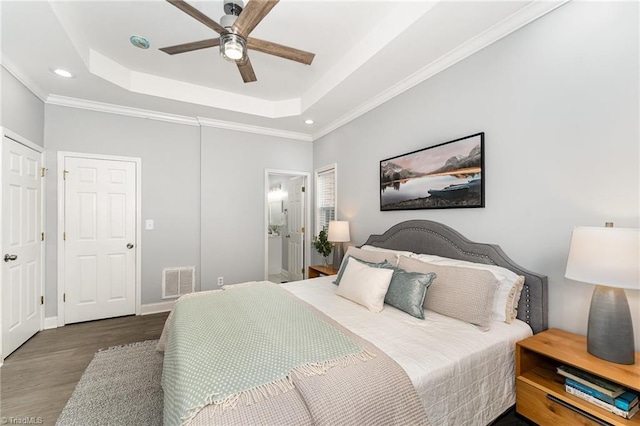 4636 Shattalon Cir, Winston-Salem, NC 27106 - bedroom with wood finished floors, recessed lighting, a tray ceiling, crown molding, and ensuite bath