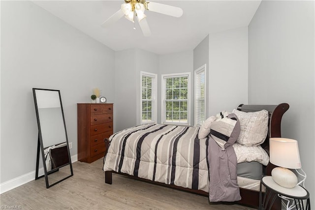 4636 Shattalon Cir, Winston-Salem, NC 27106 - bedroom with light wood finished floors, ceiling fan, and baseboards