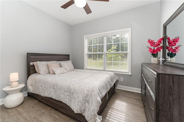 4636 Shattalon Cir, Winston-Salem, NC 27106 - bedroom with dark wood finished floors, baseboards, and ceiling fan