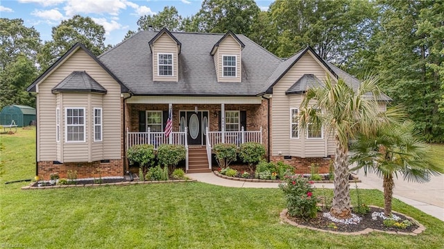 4636 Shattalon Cir, Winston-Salem, NC 27106 - new england style home featuring covered porch, a front yard, and roof with shingles