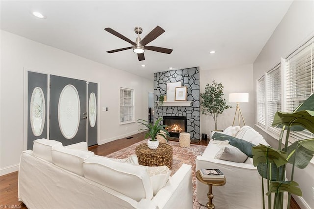 4636 Shattalon Cir, Winston-Salem, NC 27106 - living room featuring wood finished floors, ceiling fan, a stone fireplace, baseboards, and recessed lighting