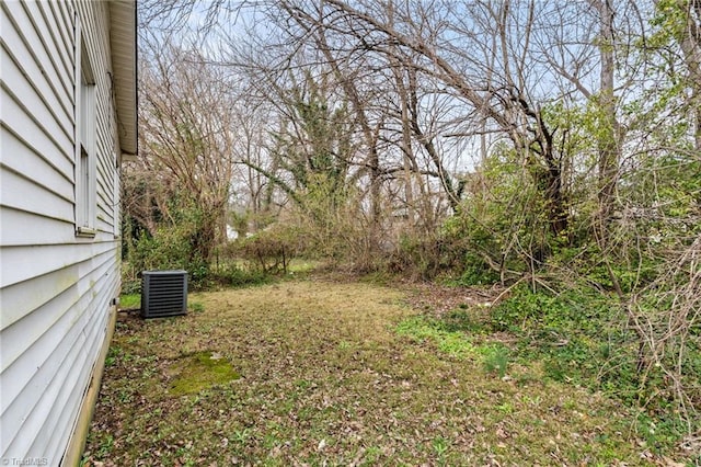 view of yard featuring central AC