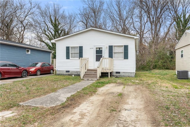 bungalow-style home featuring crawl space and central AC