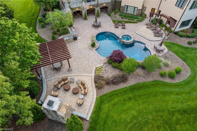 view of swimming pool featuring a lawn and a patio