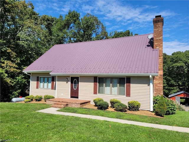 1160 Flinty Knoll Rd, Pinnacle, NC 27043 - view of front of home with a chimney, a front yard, and metal roof
