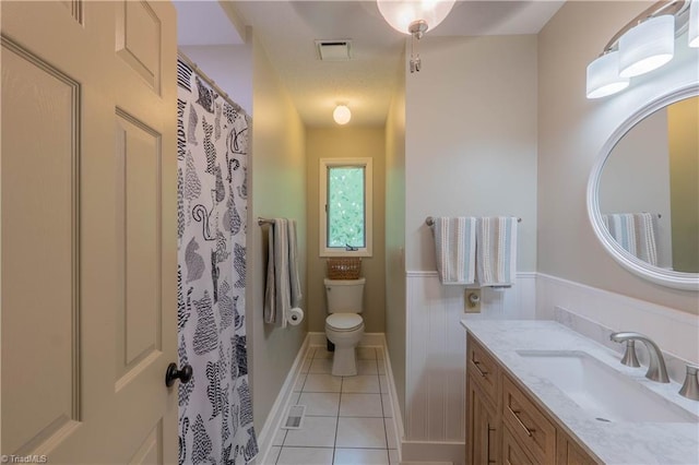 1160 Flinty Knoll Rd, Pinnacle, NC 27043 - bathroom featuring vanity, tile patterned flooring, and toilet