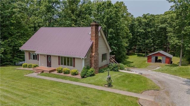 1160 Flinty Knoll Rd, Pinnacle, NC 27043 - view of front facade with a chimney, dirt driveway, a front yard, and an outbuilding