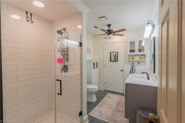 1160 Flinty Knoll Rd, Pinnacle, NC 27043 - full bathroom with toilet, a shower stall, vanity, a ceiling fan, and crown molding