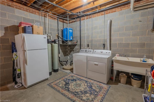 1160 Flinty Knoll Rd, Pinnacle, NC 27043 - washroom featuring washing machine and clothes dryer and concrete block wall