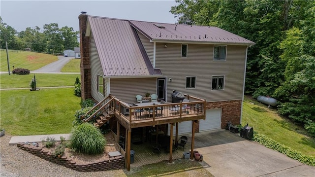 1160 Flinty Knoll Rd, Pinnacle, NC 27043 - back of property with a chimney, a garage, a wooden deck, concrete driveway, and a lawn