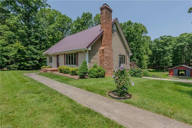 1160 Flinty Knoll Rd, Pinnacle, NC 27043 - view of property exterior featuring a chimney, a yard, an outdoor structure, and a detached garage