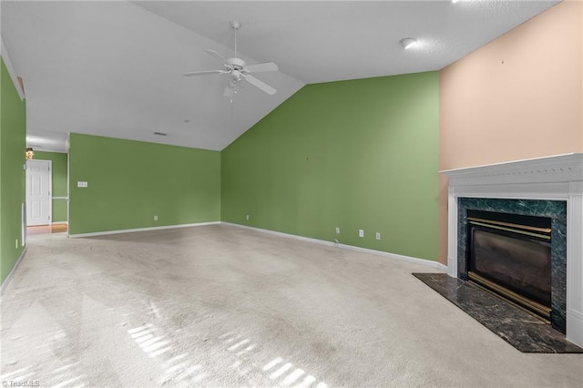 3027 Maple Ave Unit M2, Burlington, NC 27215 - unfurnished living room featuring a ceiling fan, vaulted ceiling, a fireplace, carpet flooring, and baseboards