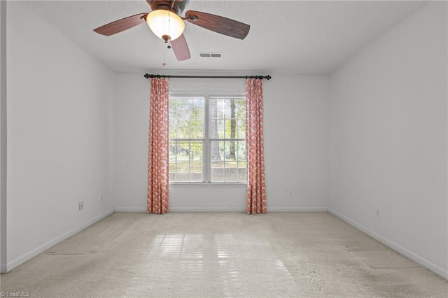3027 Maple Ave Unit M2, Burlington, NC 27215 - carpeted spare room with a ceiling fan, a textured ceiling, and baseboards