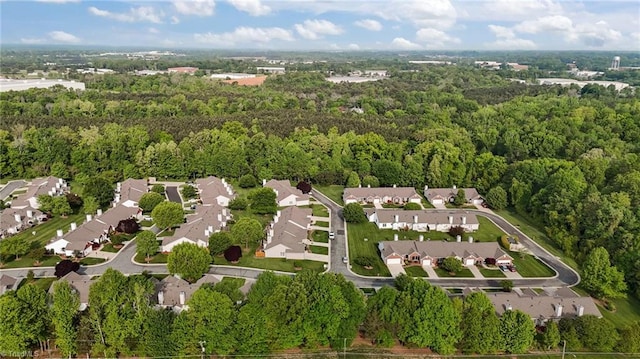 3027 Maple Ave Unit M2, Burlington, NC 27215 - aerial view of property and surrounding area featuring a forest and nearby suburban area