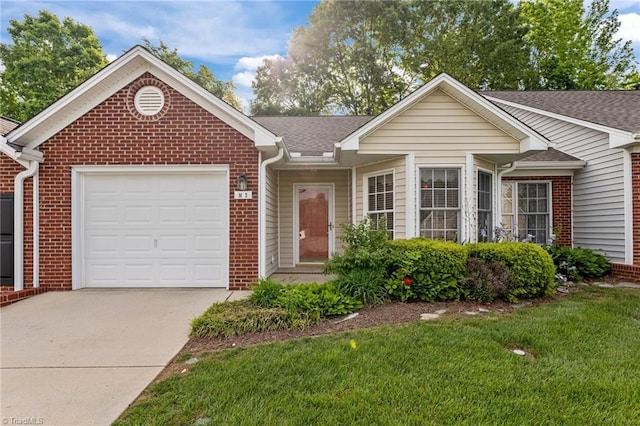 3027 Maple Ave Unit M2, Burlington, NC 27215 - ranch-style house featuring brick siding, concrete driveway, a garage, a front lawn, and roof with shingles