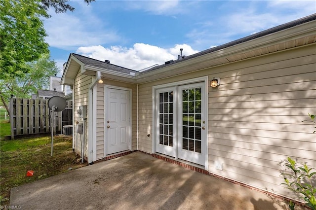 3027 Maple Ave Unit M2, Burlington, NC 27215 - property entrance featuring a patio and central air condition unit