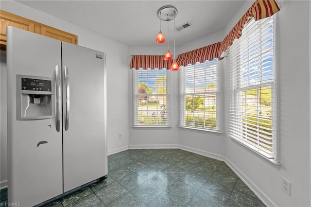 3027 Maple Ave Unit M2, Burlington, NC 27215 - unfurnished dining area with baseboards