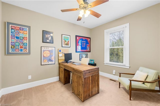 office area featuring light colored carpet and ceiling fan