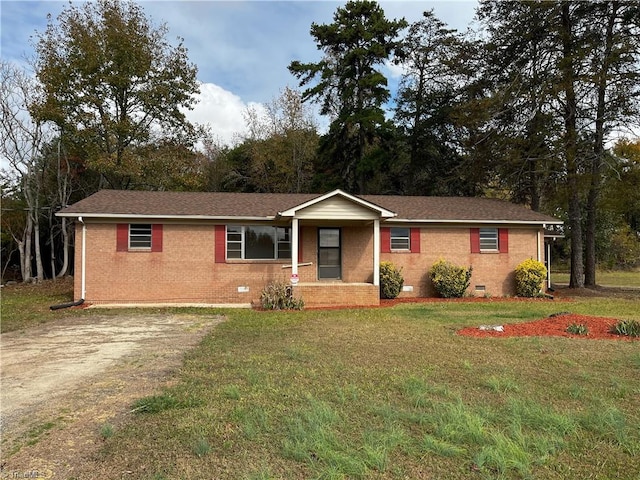 single story home with a front lawn