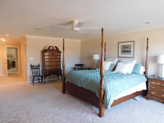 bedroom featuring ornamental molding, light carpet, and ceiling fan