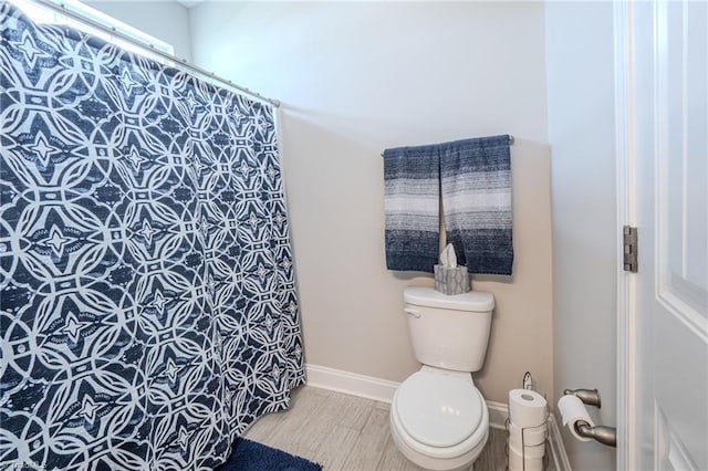 109 Red Maple Way, King, NC 27021 - full bath with toilet, wood finished floors, baseboards, and a shower with curtain